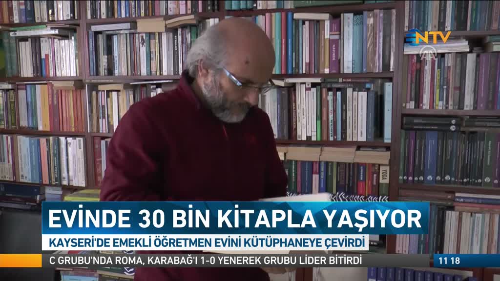 evinde 30 bin kitapla yasiyor ntv